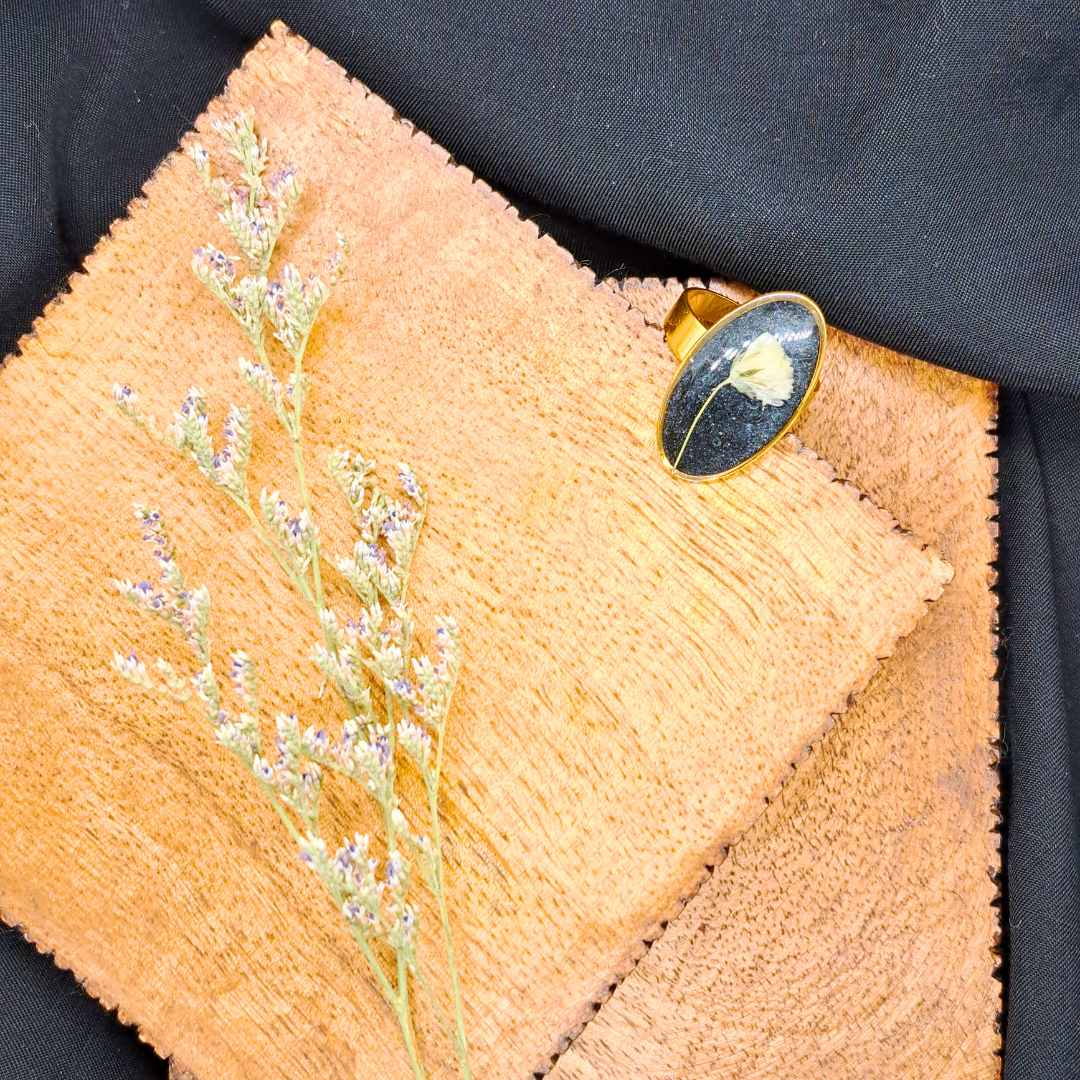 Medium Oval Ring - Real White Pressed Flowers in Black Resin Set in Gold-Plated Stainless Steel