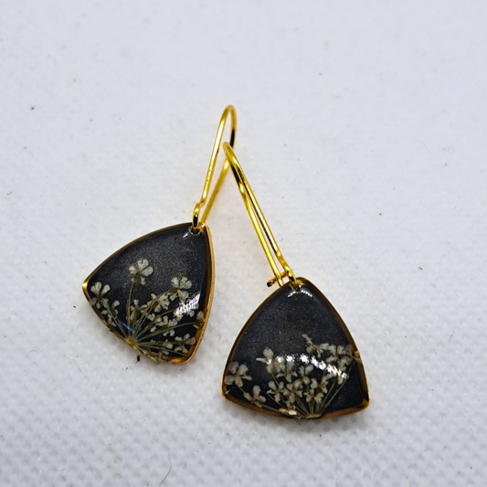 Small Curved Triangle Dangle Earring - Real White Pressed Flowers in Black Resin Set in Gold-Plated Stainless Steel